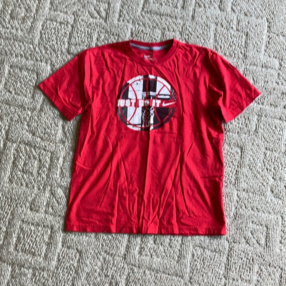 Three Medium Nike t-shirts